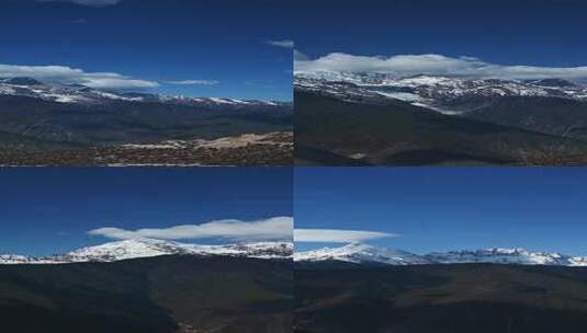 蓝天白云下的梅里雪山竖屏高清在线视频素材下载