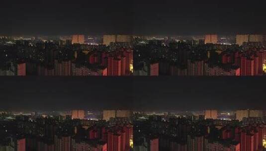 城市夜景中灯光璀璨的建筑物高清在线视频素材下载