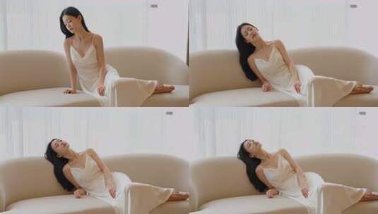 女子沙发上惬意休憩高清在线视频素材下载