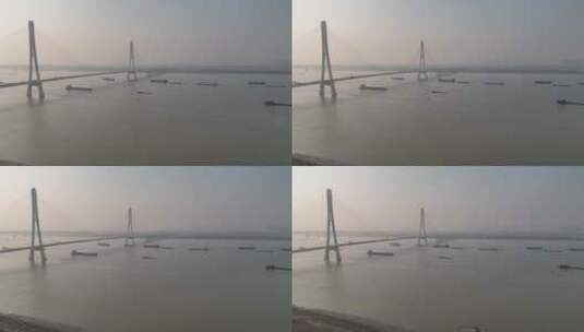 南京大胜关长江大桥夕阳江面货轮航拍高清在线视频素材下载