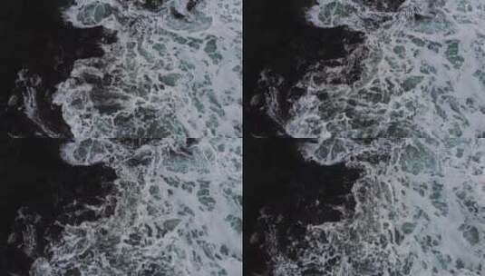 海浪拍打着沿岸的礁石高清在线视频素材下载