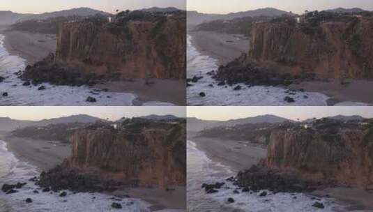 绕着海滩上的岩石飞来飞去高清在线视频素材下载