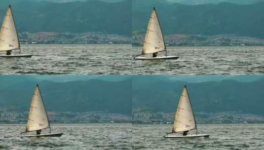 在海上航行的小帆船高清在线视频素材下载