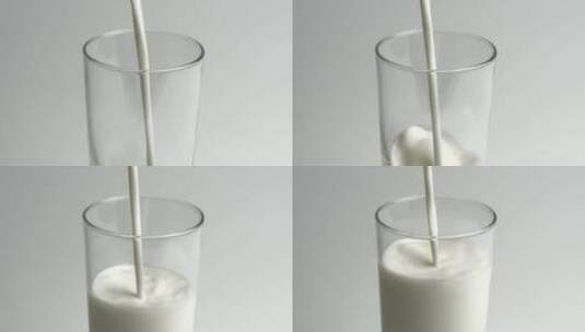 牛奶倒进透明玻璃杯里高清在线视频素材下载