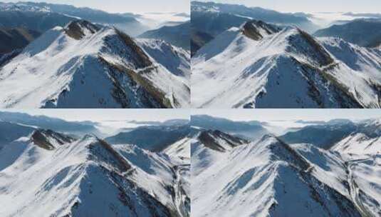 夹金山冬季航拍白雪覆盖山脊高清在线视频素材下载