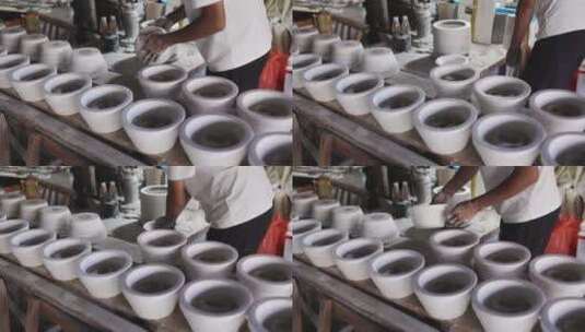 景德镇陶瓷工厂陶艺工加工半成品高清在线视频素材下载