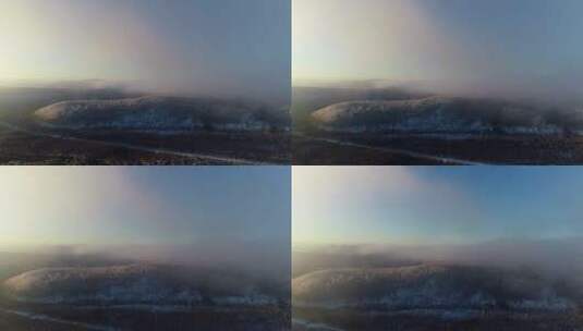 航拍冬季山林雾凇晨雾朝阳高清在线视频素材下载