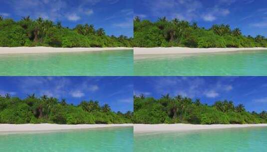 白沙天堂海滩和蓝色水域背景的日间无人机抽象照片，色彩缤纷4K高清在线视频素材下载