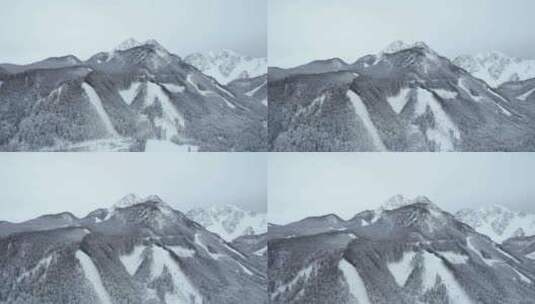 白雪皑皑的奥地利阿尔卑斯山的远处鸟瞰图。巨大的山脉。高清在线视频素材下载
