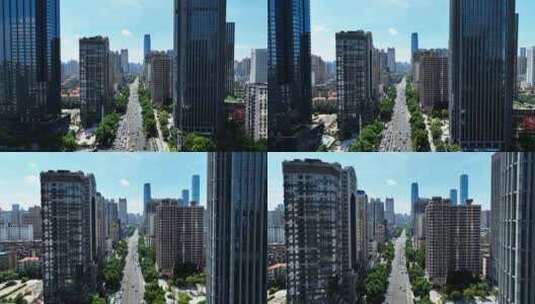 长沙现代化城市高楼建筑中间穿梭高清在线视频素材下载
