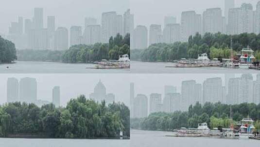 浑河小岛码头岸边高楼雨雾朦胧高清在线视频素材下载