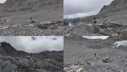 航拍攀登川西贡嘎山卫峰乌库楚雪山的登山者高清在线视频素材下载