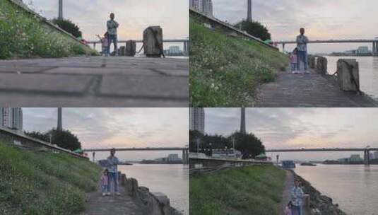 一对父女站在珠江畔高清在线视频素材下载