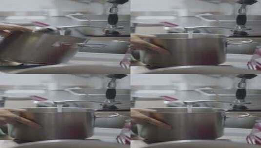 厨房水龙头旁男厨师注水锅侧视图高清在线视频素材下载