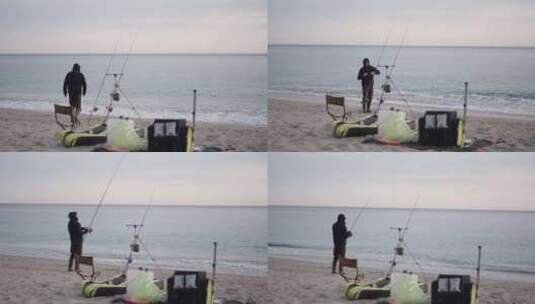 垂钓者调整鱼竿上的鱼线高清在线视频素材下载