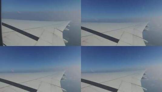 在蓝天中飞行的飞机机翼11高清在线视频素材下载