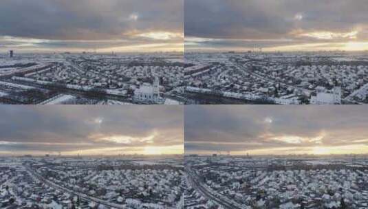 日落时分，无人机飞越白雪皑皑的哥本哈根高清在线视频素材下载