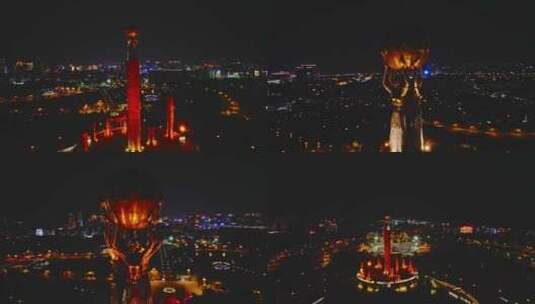 楚雄彝族十月太阳历文化公园雕塑夜景航拍高清在线视频素材下载