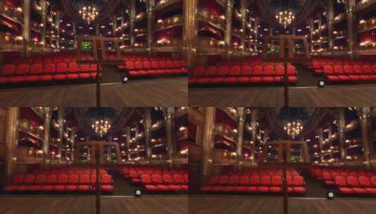 一个有红色座位和吊灯的空剧院高清在线视频素材下载