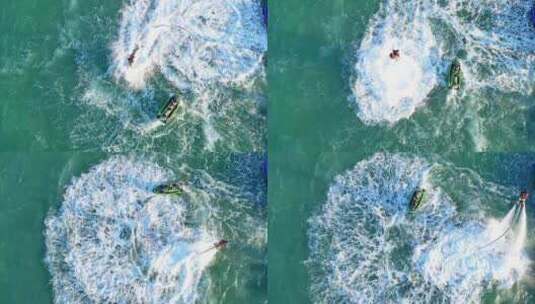 海南三亚高视角航拍水上项目空中飞人摩托艇高清在线视频素材下载