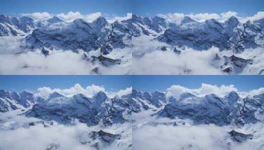 雪山山顶翻腾的云雾高清在线视频素材下载
