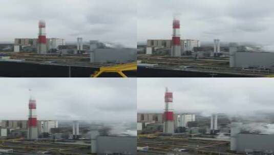 从雾中管道高度看火力发电站的能量提取高清在线视频素材下载