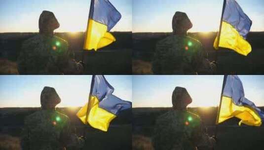 身穿军装的乌克兰士兵举着挥舞的乌克兰国旗高清在线视频素材下载