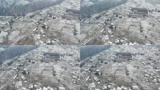 大自然寒潮冬天下雪的村庄田野航拍风景高清在线视频素材下载