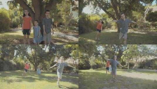 夏天，三个兄弟姐妹在花园里玩飞机高清在线视频素材下载