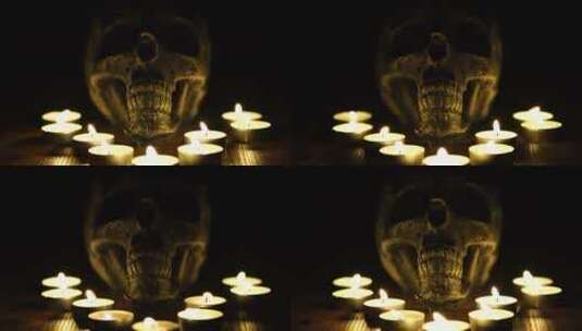骷髅和点燃的蜡烛高清在线视频素材下载