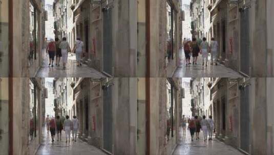 克罗地亚人走在狭窄的小巷里高清在线视频素材下载