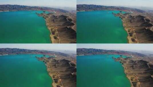 航拍翠绿的黑山湖高清在线视频素材下载