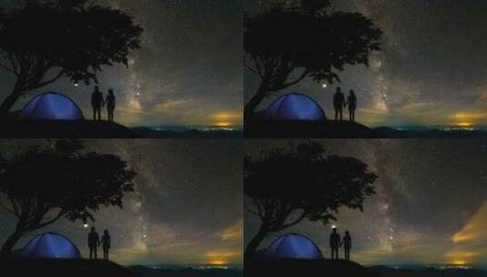 夜晚情侣在山顶看流星雨高清在线视频素材下载