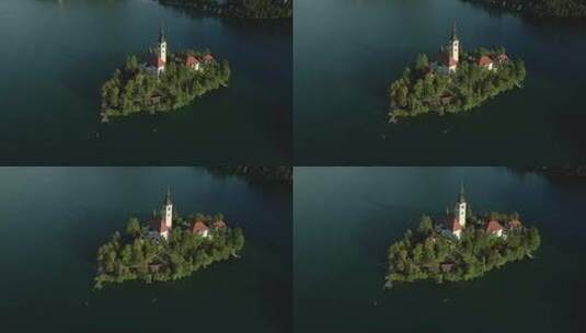斯洛文尼亚旅游目的地布莱德岛上完美的黄金时段阳光与pletna船高清在线视频素材下载
