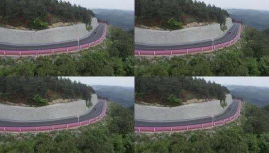 在山路行驶的摩托车高清在线视频素材下载