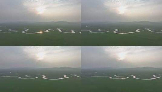 航拍夏日雾霭草原曲河莫日格勒河高清在线视频素材下载