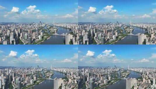 航拍蓝天白云下的广东广州城市风光高清在线视频素材下载