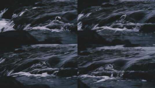 河水在鹅卵石上温柔的流动高清在线视频素材下载