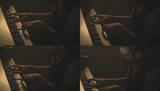 男人在聚精会神的练习钢琴高清在线视频素材下载