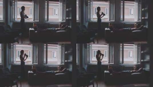 情侣在卧室拍照高清在线视频素材下载