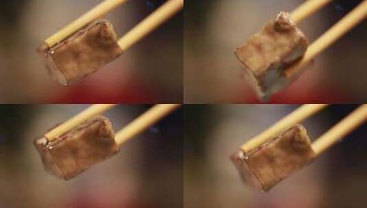 夹起一筷子腐乳抹馒头馒头夹腐乳高清在线视频素材下载