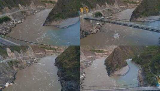 西藏江河视频航拍藏区江上的铁索桥和车辆高清在线视频素材下载