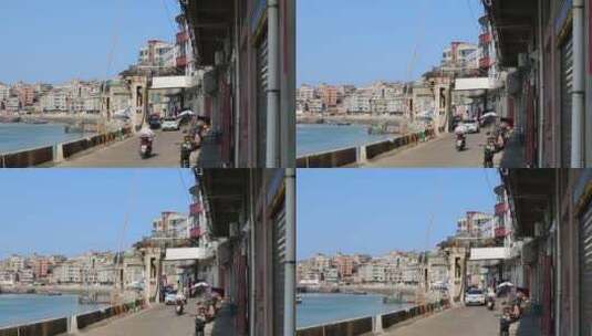 海边渔村骑车高清在线视频素材下载