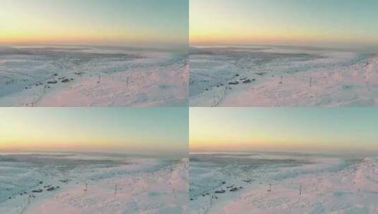 白雪覆盖的山上升起的日出高清在线视频素材下载