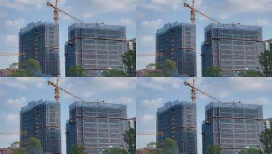 蓝天白云塔吊建筑工地建筑高楼施工高清在线视频素材下载