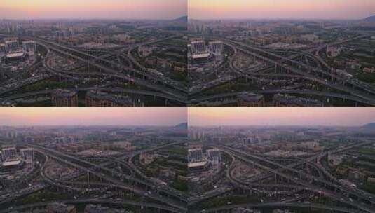 航拍夕阳下杭州城区高架立交桥高清在线视频素材下载