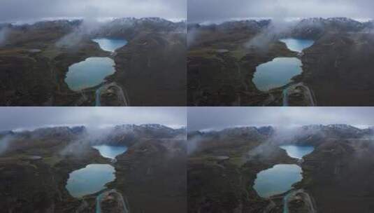 航拍雨雾天的川藏线姊妹湖风光高清在线视频素材下载