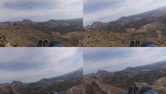 4K滑翔伞运动飞行在蓝天白云草地树林间高清在线视频素材下载