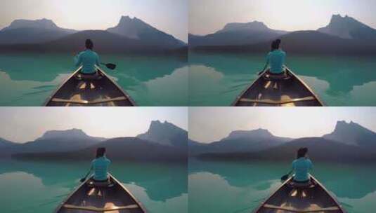 一名女子在湖中乘船旅行高清在线视频素材下载
