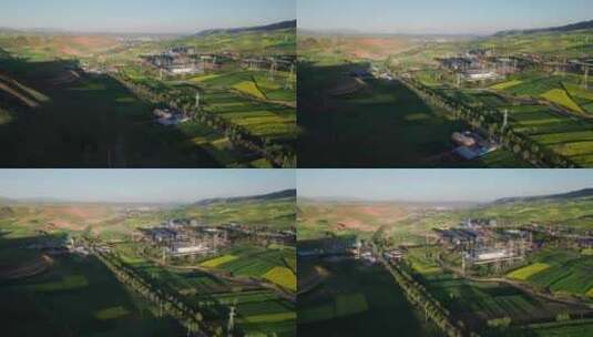 青海省海东市田地上的国家电网航拍高清在线视频素材下载